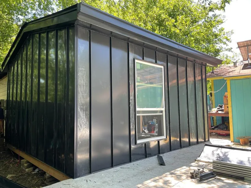 Black standing seam metal wall panels for Metal Roof Installation in Appleton