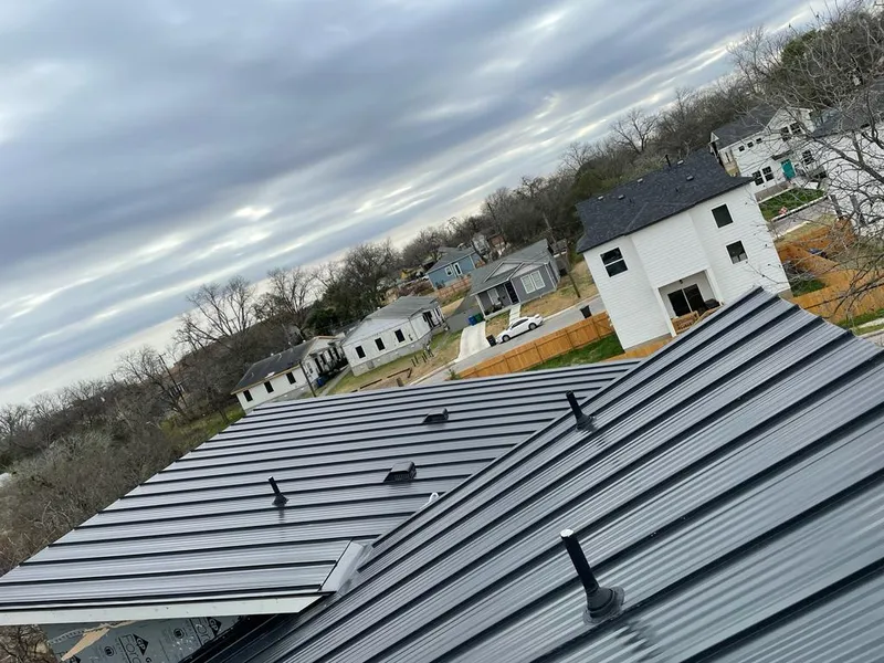 Standing seam metal roof panels with vents for Skylight Repair in Appleton